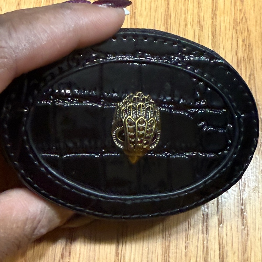 Kurt Geiger Black Patent Leather Oval Wallet with Gold Emblem